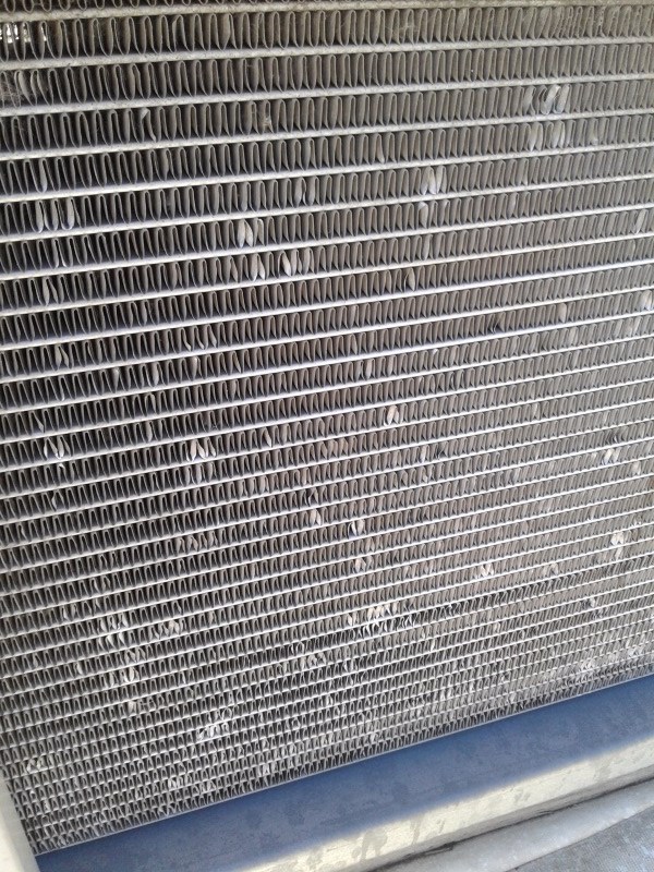Hail damage to a microchannel coil 