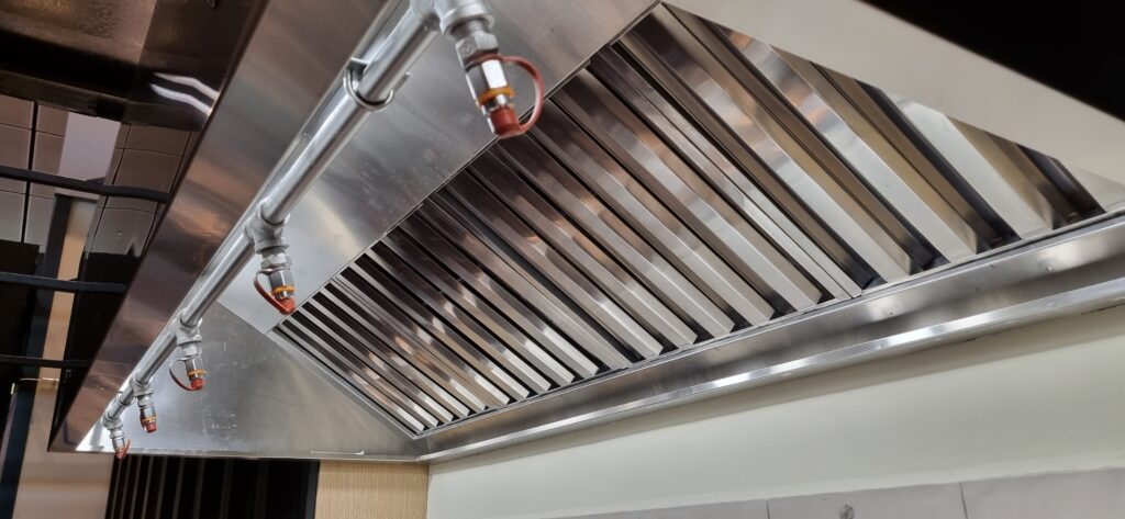 Commercial kitchen hoods exhaust contaminated air and grease. 